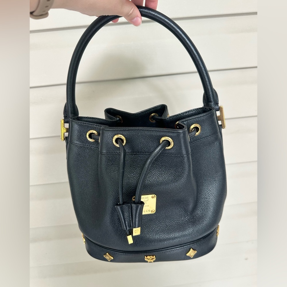 MCM Black Leather Bucket Bag with Gold Accents